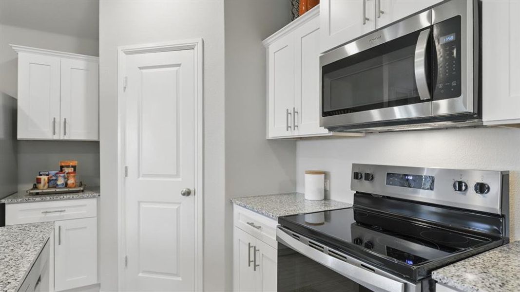 Furnished interior view inside a new home in Lonestar at Liberty Trails, Fort Worth (Image 17).