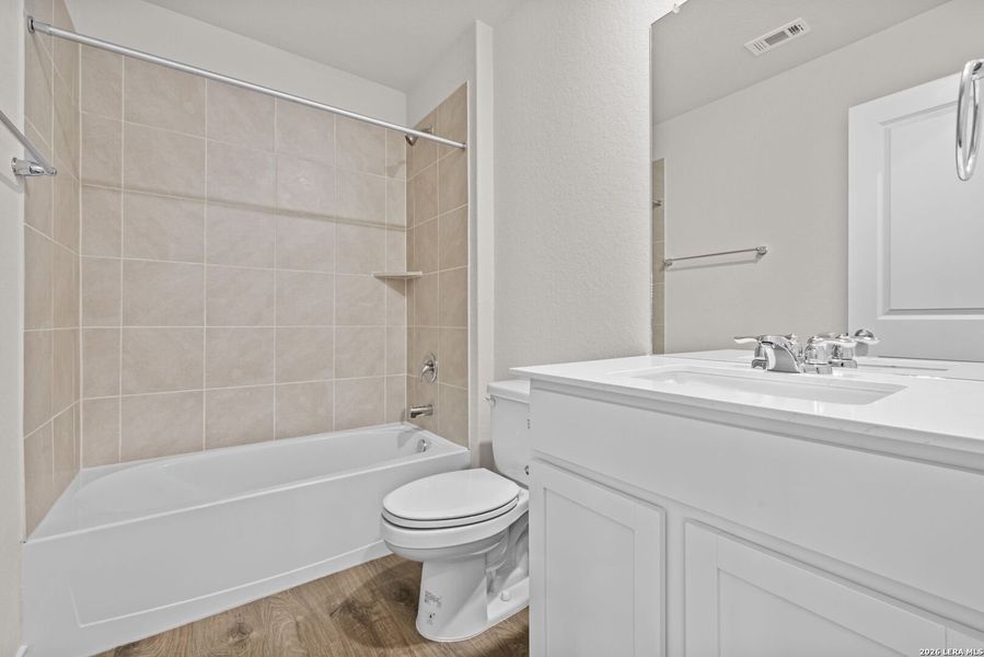 Furnished interior view inside a new home in Redbird Ranch, San Antonio (Image 8).