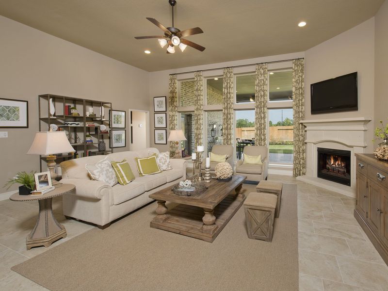 Representative furnished interior of a home built from the 3578W by Perry Homes in Lakes of Cane Island, Katy (Image 11).