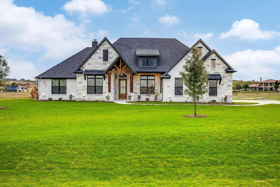 Representative exterior photo of a completed home built from the The Nathan by Elmwood Custom Homes in Matthews Farm, Venus, TX (Image 8). Representative exterior photo of a completed home built from the The Nathan by Elmwood Custom Homes in Matthews Farm, Venus, TX (Image 8).