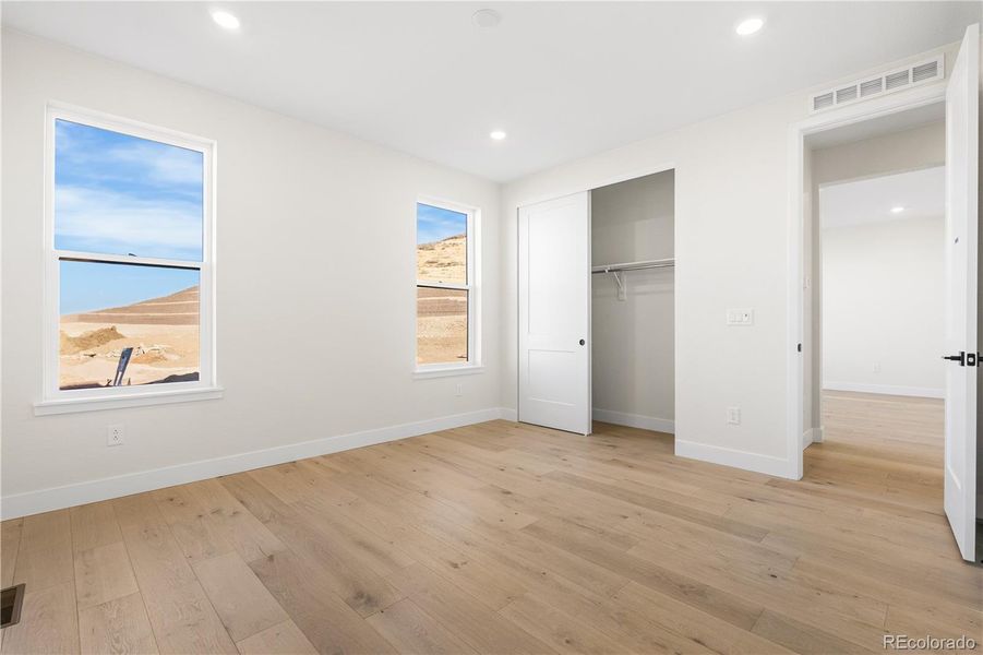 Spacious, unfurnished interior of a new home in Autograph at Lyric, Lone Tree (Image 26).