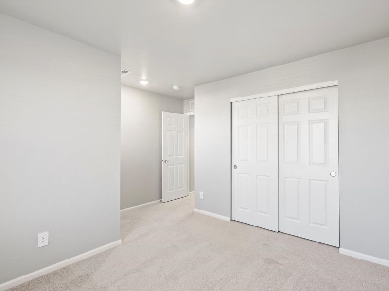 Spacious, unfurnished interior of a new home in Lorson Ranch : The Springs Collection, Colorado Springs (Image 15).