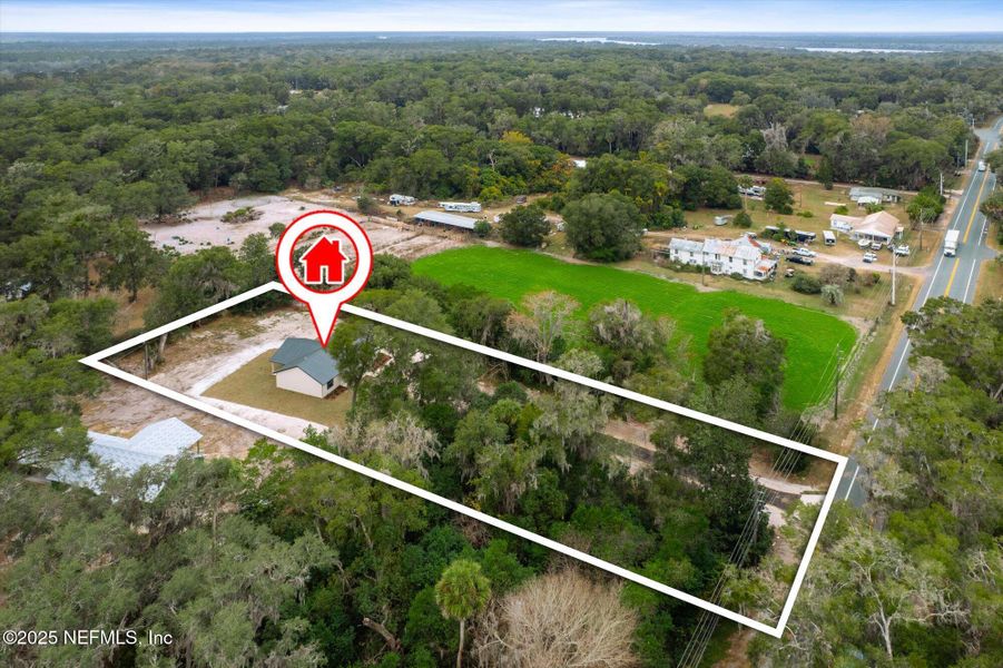 Front exterior of a new home in , San Mateo, FL, highlighting curb appeal (Image 29). Front exterior of a new home in , San Mateo, FL, highlighting curb appeal (Image 29).