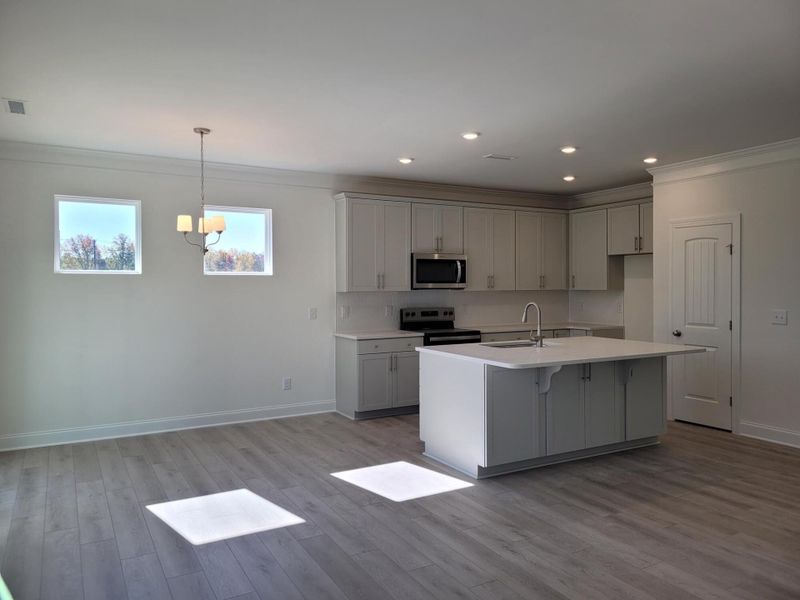 Furnished interior view inside a new home in 1158 Place, Wilson (Image 5).