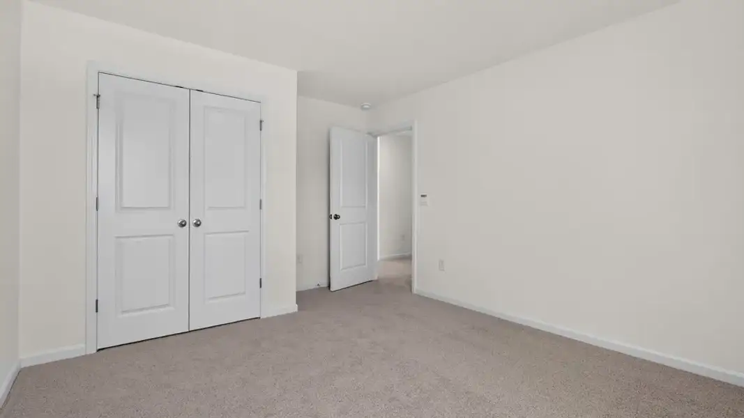 Spacious, unfurnished interior of a new home in Madden West, Fuquay Varina (Image 26).