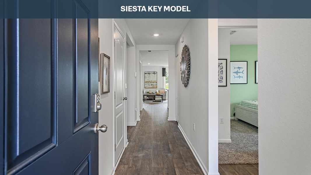 Representative furnished interior of a home built from the Siesta Key by D.R. Horton in Sawmill Branch Express, Palm Coast (Image 6).