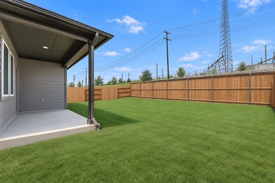 Exterior details and patio area of a home in Sunfield, Buda (Image 26).