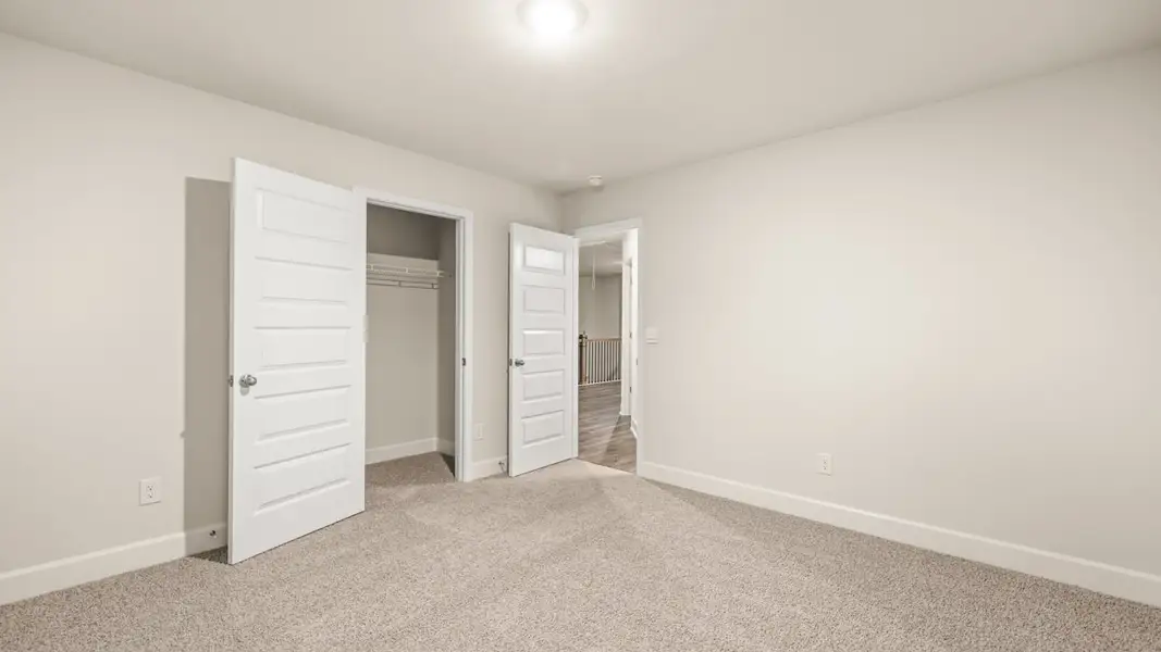 Representative unfurnished interior of a home built from the Jean Lee by D.R. Horton in Heritage Pointe, Senoia (Image 28).