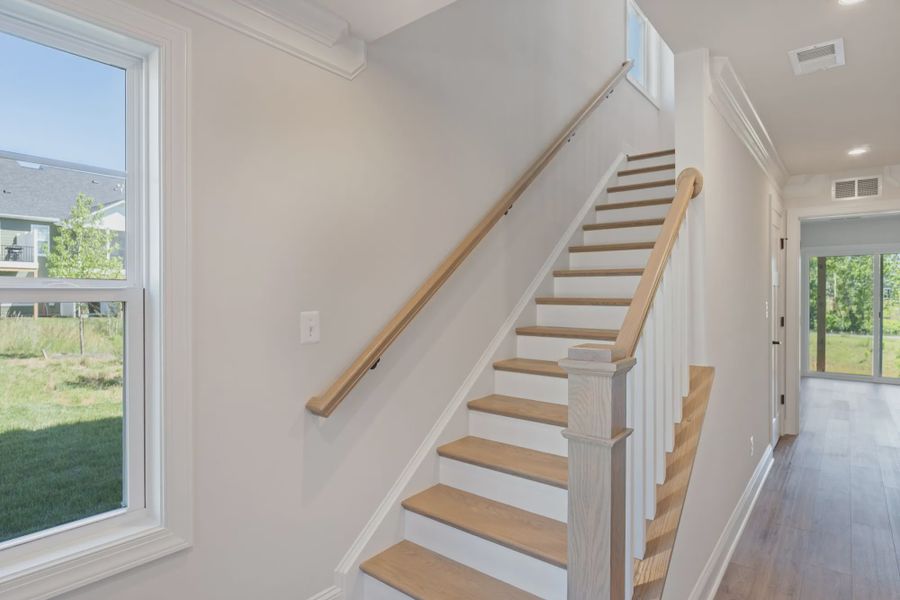 Furnished interior in a model home at Sherron Road Townes in Durham (Image 26).