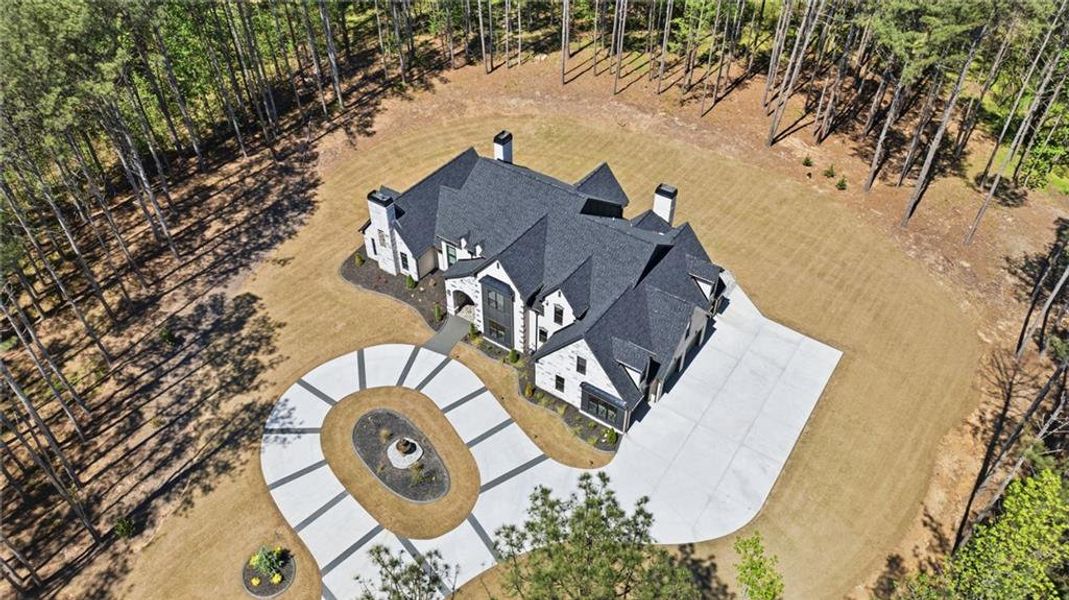 Front exterior of a new home in , Tyrone, GA, highlighting curb appeal (Image 34).