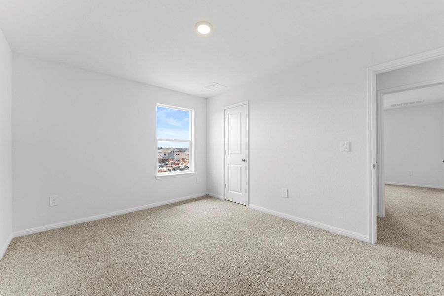 Spacious, unfurnished interior of a new home in Bar W Ranch, Leander (Image 31).