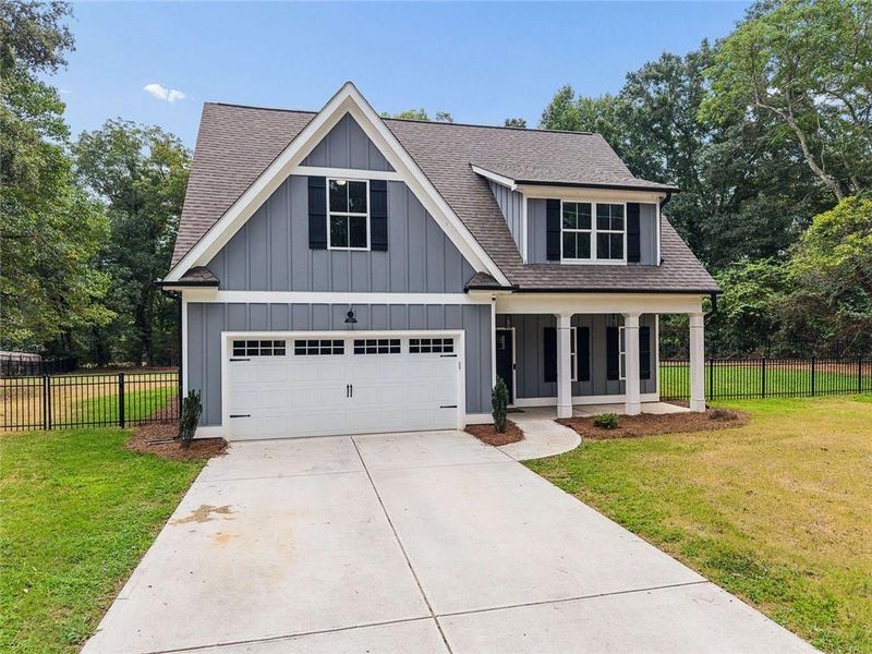 Front exterior of a new home in , Covington, GA, highlighting curb appeal (Image 26).