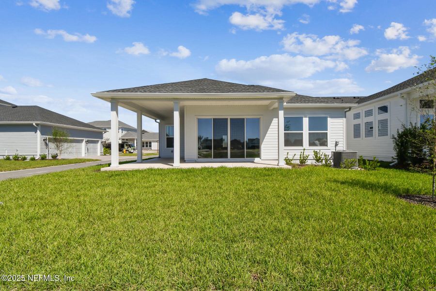 Exterior details and patio area of a home in Seven Pines 50' Front Entry, Jacksonville (Image 1).