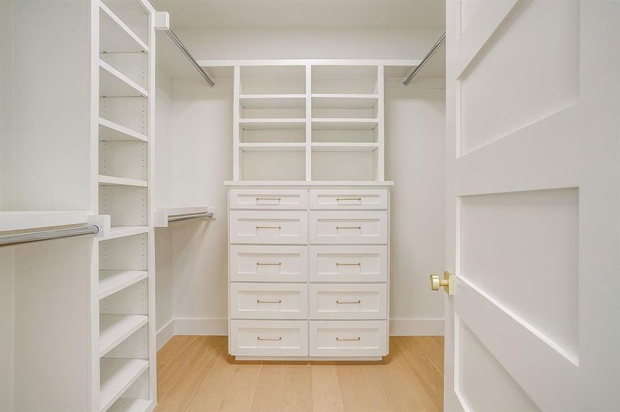 larg primary closet with custom drawers and adjustable shelving larg primary closet with custom drawers and adjustable shelving