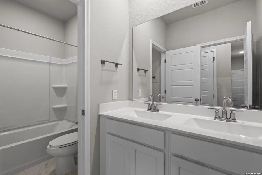 Furnished interior view inside a new home in Morgan Meadows, San Antonio (Image 8).