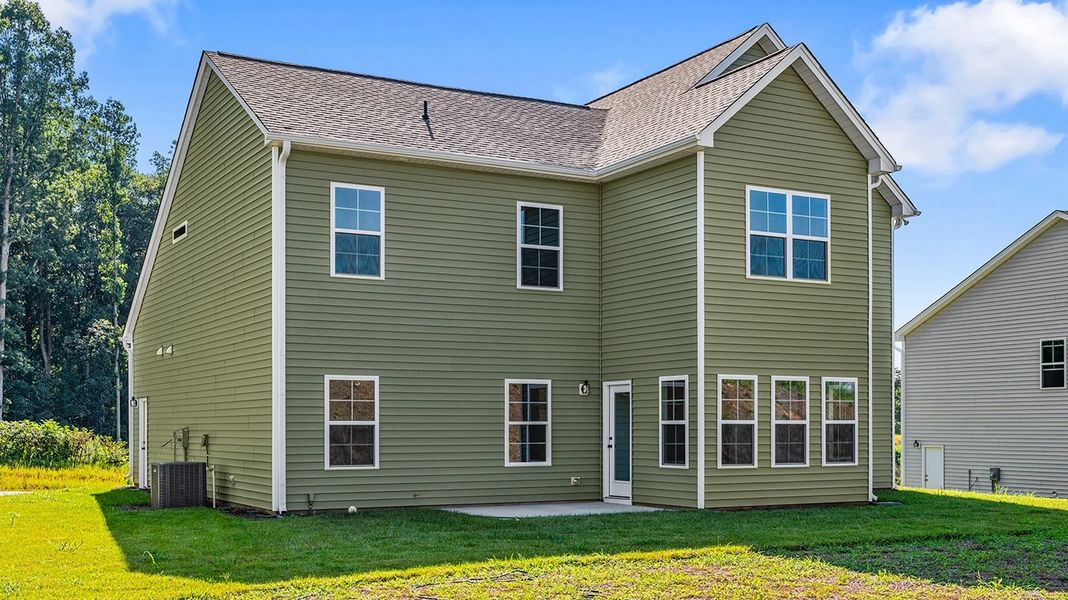 Front exterior of a new home in Brooke Hill, Lewisville, NC, highlighting curb appeal (Image 26).