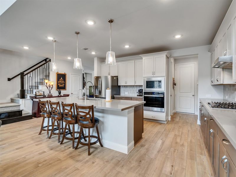 Furnished interior view inside a new home in ARTAVIA, Conroe (Image 13).