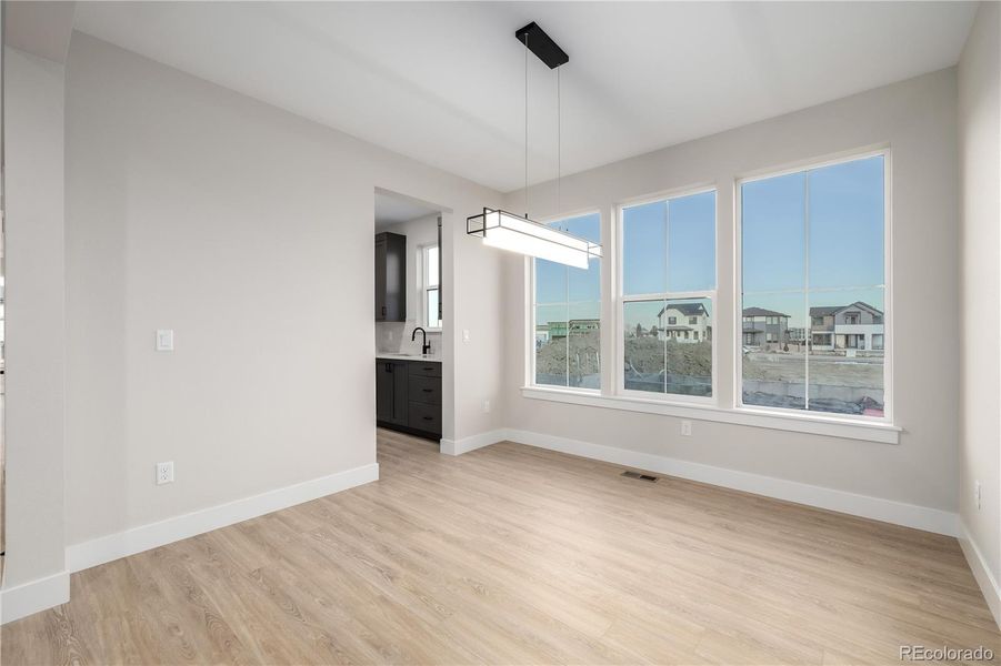Spacious, unfurnished interior of a new home in West Grange, Longmont (Image 38).