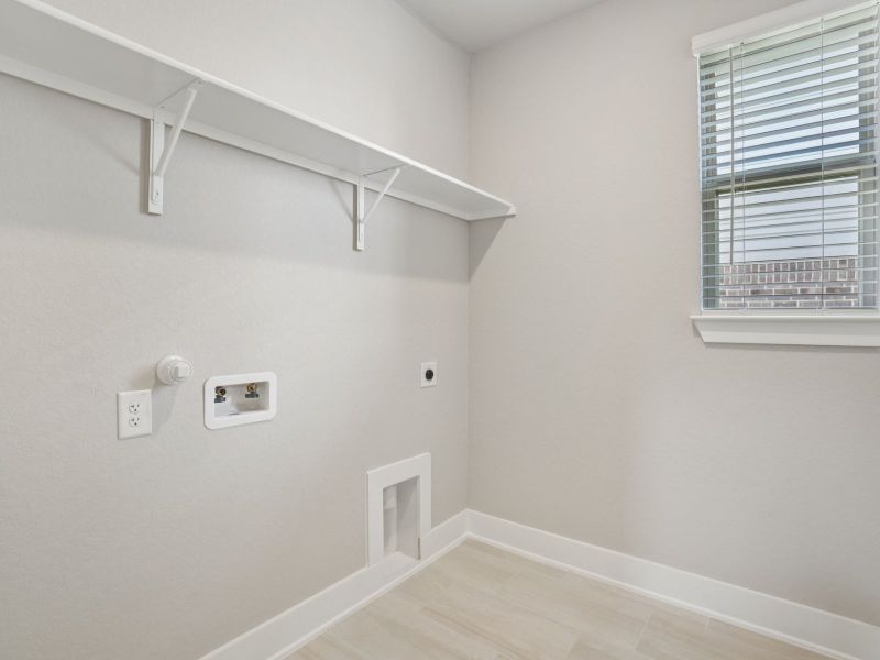 Laundry in the San Jacinto floorplan at a Meritage Homes community. Laundry in the San Jacinto floorplan at a Meritage Homes community.