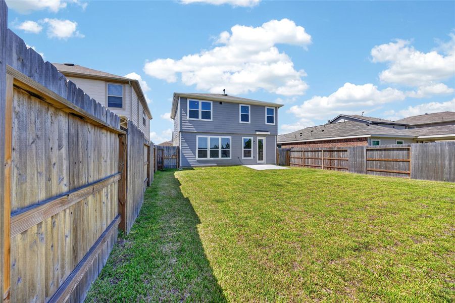 Exterior details and patio area of a home in , Katy (Image 26).