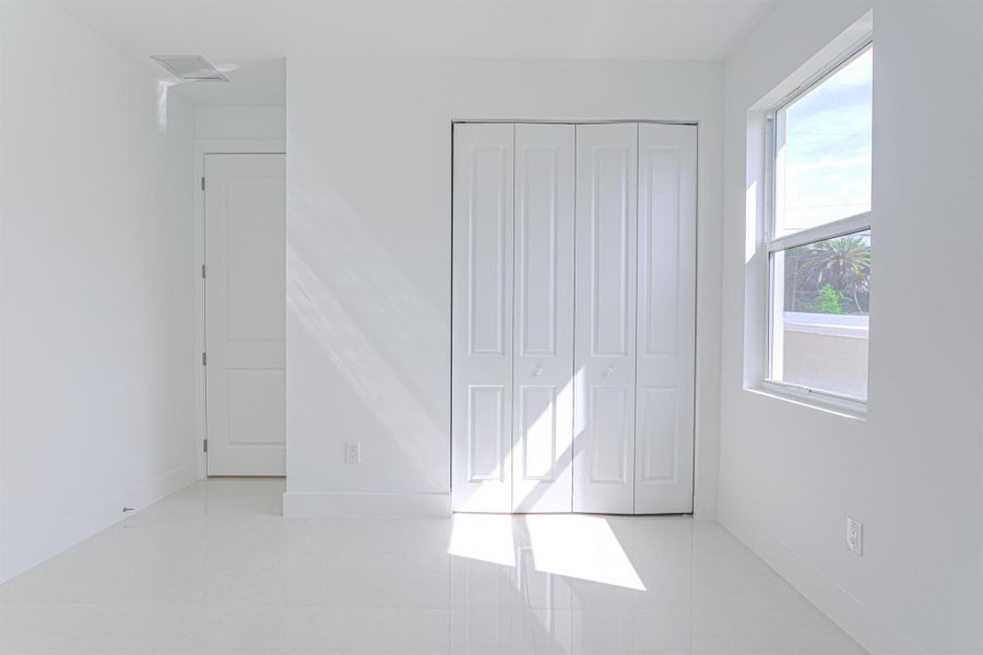 Spacious, unfurnished interior of a new home in , Jupiter (Image 14).