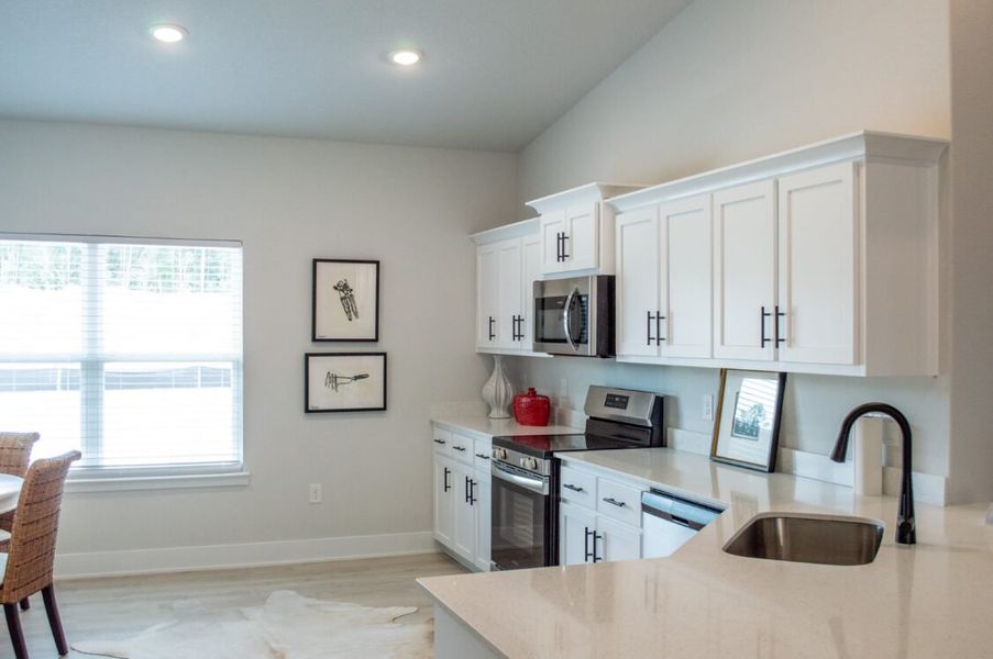 Furnished interior view inside a new home in Parkland Place, Pace (Image 8).