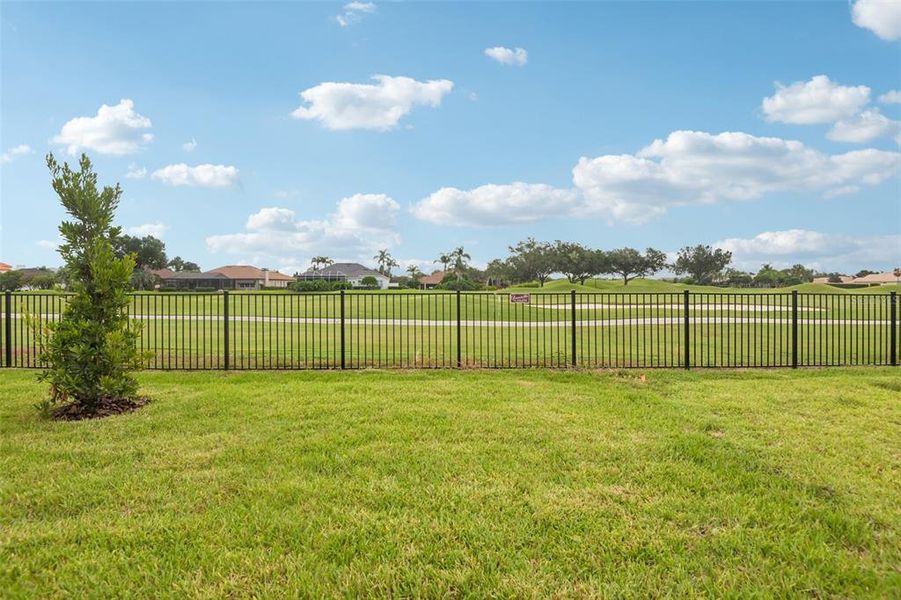 Exterior details and patio area of a home in Grasslands West, Lakeland (Image 18).