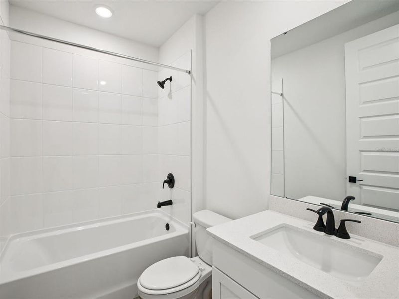 Furnished interior view inside a new home in Two Rivers - Signature Series, Zephyrhills (Image 14). Furnished interior view inside a new home in Two Rivers - Signature Series, Zephyrhills (Image 14).