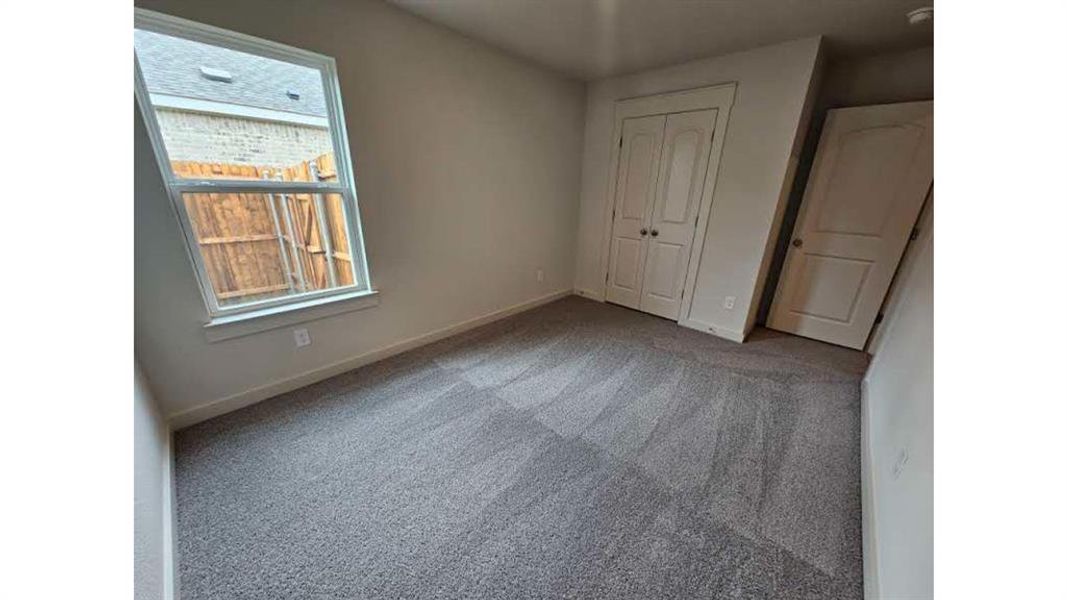 Light gray carpeting with a subtle pattern Light gray carpeting with a subtle pattern