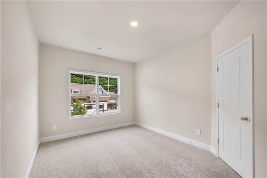 Spacious, unfurnished interior of a new home in Hidden Fields, Hoschton (Image 42).