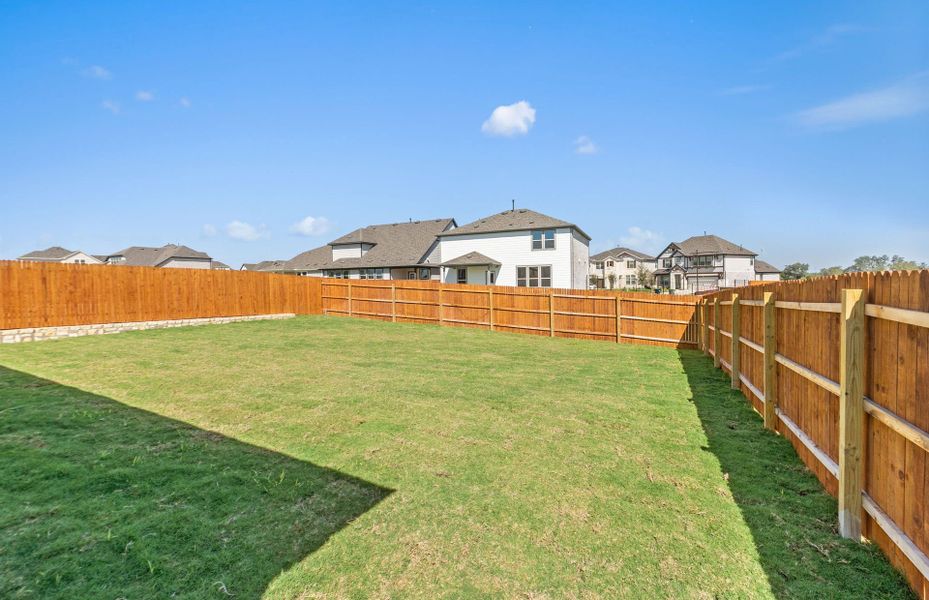 Exterior details and patio area of a home in Saddleback at Santa Rita Ranch, Liberty Hill (Image 18). Exterior details and patio area of a home in Saddleback at Santa Rita Ranch, Liberty Hill (Image 18).