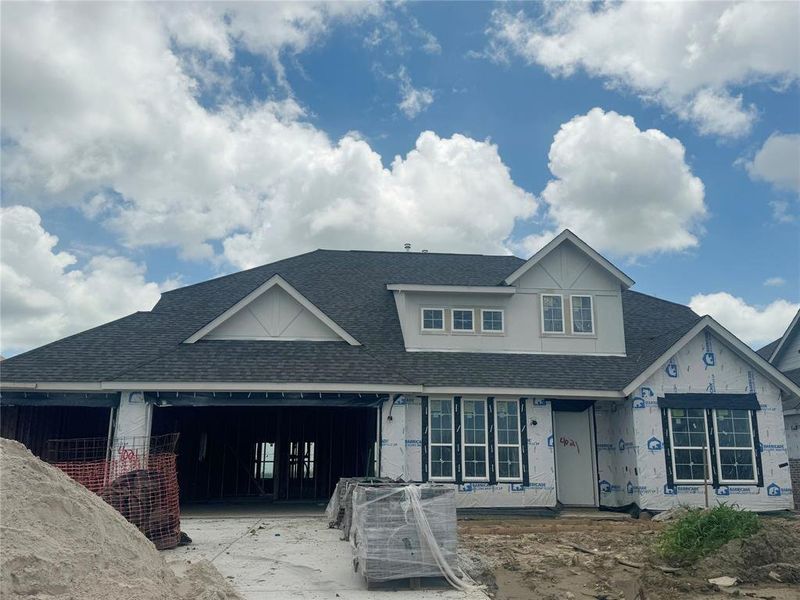 Two-story home with 4 bedrooms, 3.5 baths and 3 car attached garage