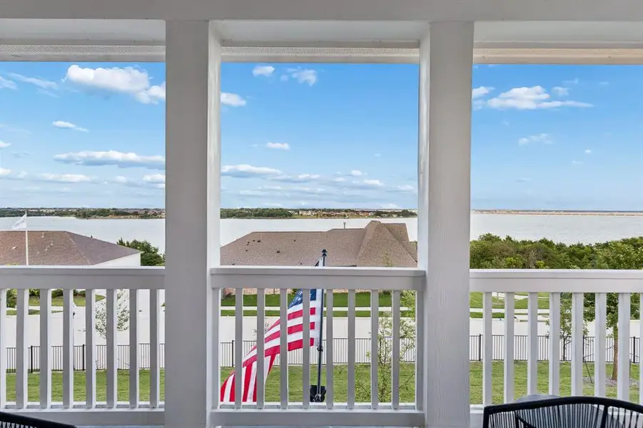 View from Front Balcony
The front balcony offers another vantage point to enjoy lake views, morning coffee, evening sunsets, and refreshing breezes throughout the day.