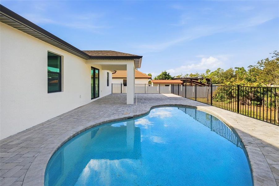 Exterior details and patio area of a home in , Port Charlotte (Image 20).