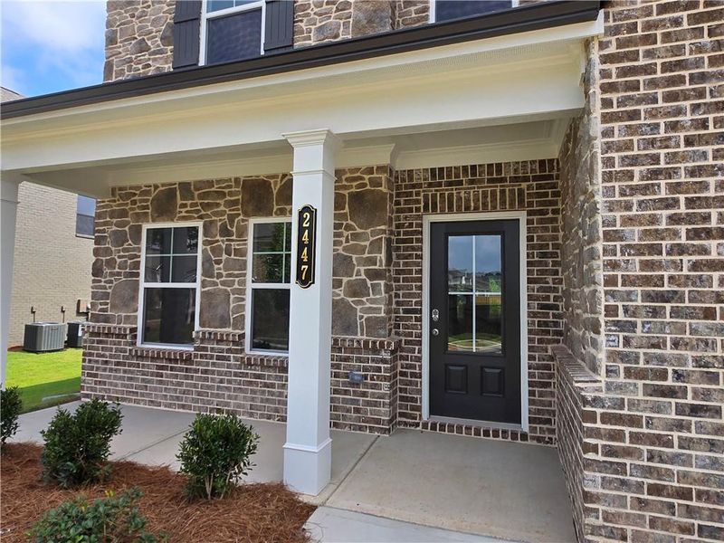 Exterior details and patio area of a home in Pinecrest Ridge, Dacula (Image 4).