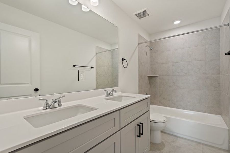 Furnished interior view inside a new home in Crosswinds, Kyle (Image 15).