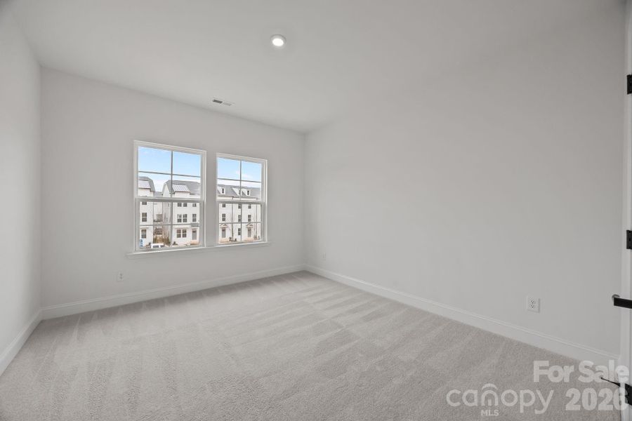 Spacious, unfurnished interior of a new home in The River District Townhomes, Charlotte (Image 18).