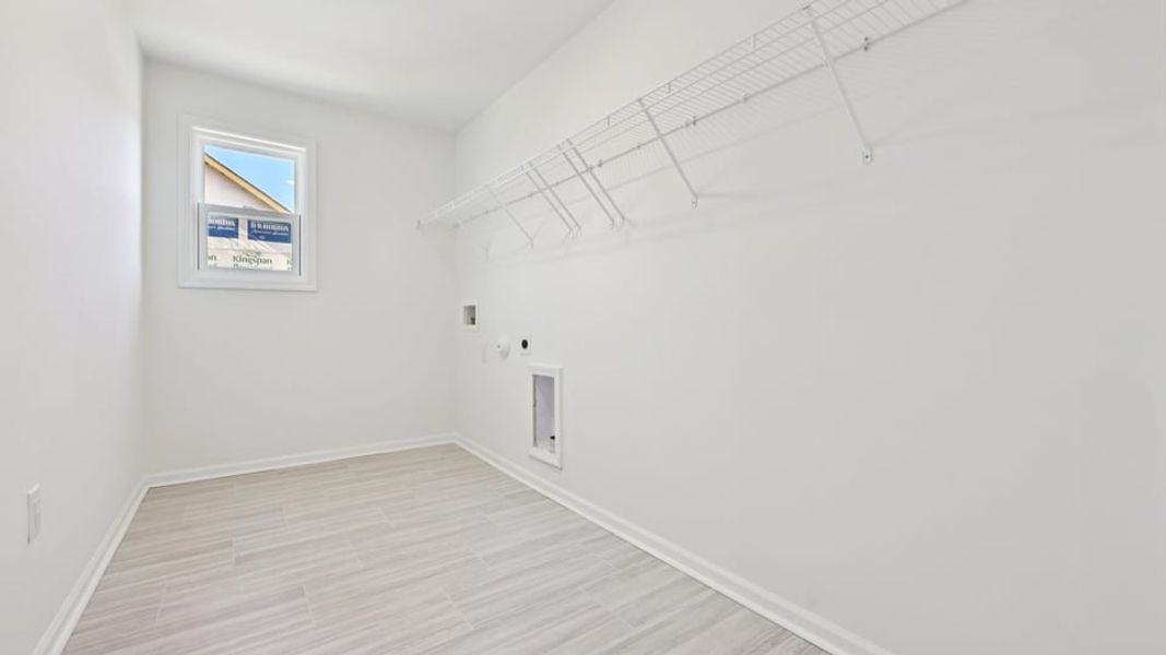 Representative unfurnished interior of a home built from the Wylie by D.R. Horton in Eagle Creek, Fuquay Varina (Image 34).