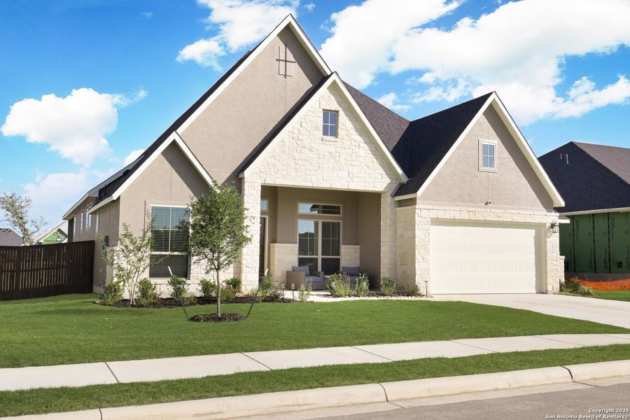 Front exterior of a new home in Mesa Western, Cibolo, TX, highlighting curb appeal (Image 18).