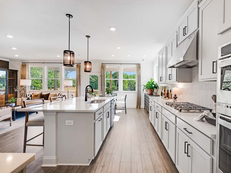 Representative furnished interior of a home built from the Essex by Taylor Morrison in Bailey Fence, Dacula (Image 11).