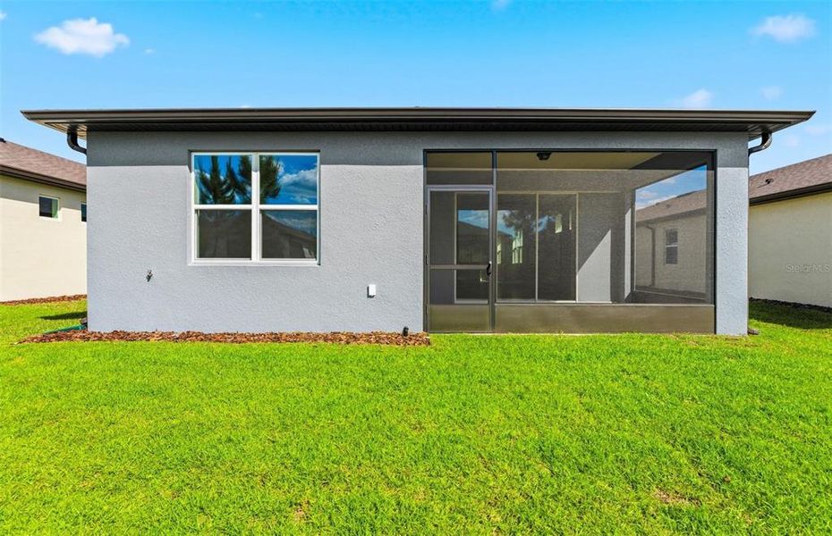 Exterior details and patio area of a home in Del Webb Stone Creek, Ocala (Image 4).