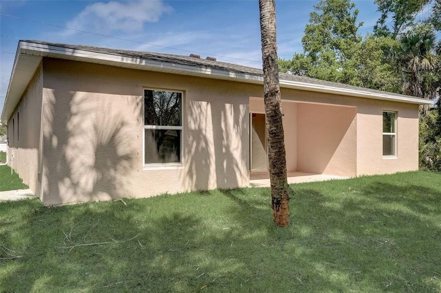 Exterior details and patio area of a home in Citrus Springs, Citrus Springs (Image 16).