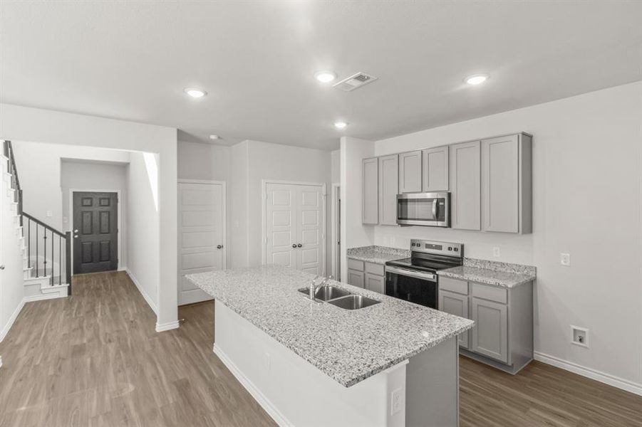 Furnished interior view inside a new home in Retreat at Fossil Creek, Fort Worth (Image 5). Furnished interior view inside a new home in Retreat at Fossil Creek, Fort Worth (Image 5).