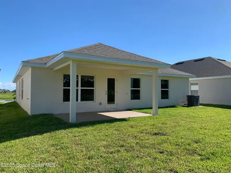 Exterior details and patio area of a home in St. John Preserve, Palm Bay (Image 2). Exterior details and patio area of a home in St. John Preserve, Palm Bay (Image 2).