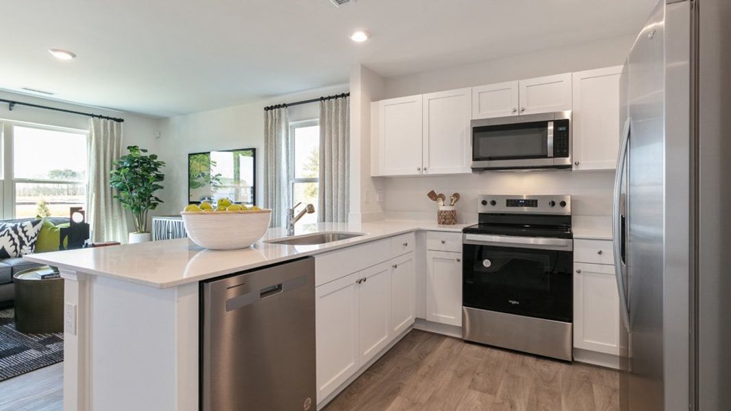 Furnished interior view inside a new home in The Townes at Ridgewood Farms, Winterville (Image 5).