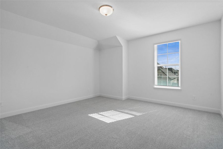 Perfect for entertaining is this amazing Game Room! Right upstairs this space would be a fabulous teen hangout or adult game room complete with enough room for a pool table and big screen TVs! Featuring plush carpet, high ceilings, custom paint and large window with privacy blinds!