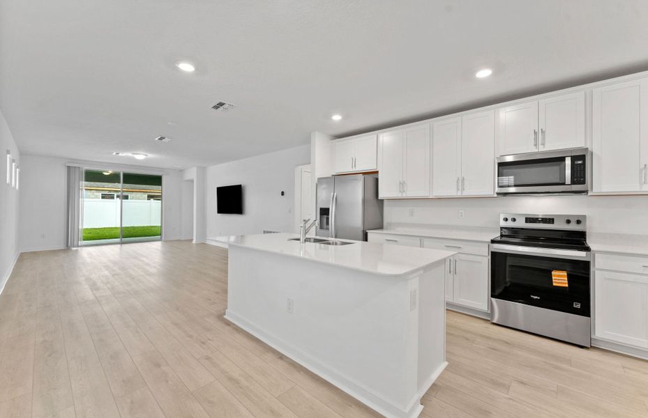 Furnished interior view inside a new home in Caldera, Spring Hill (Image 8).