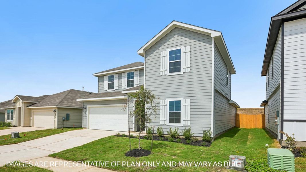 Front exterior of a new home in Prairie Lakes, Buda, TX, highlighting curb appeal (Image 2).