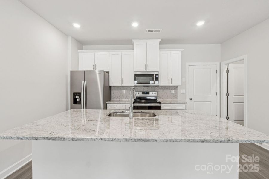 Photo is not of the actual home, but is an inspirational photo of builder’s model home and may depict options, furnishings, and/or decorator features that are not included