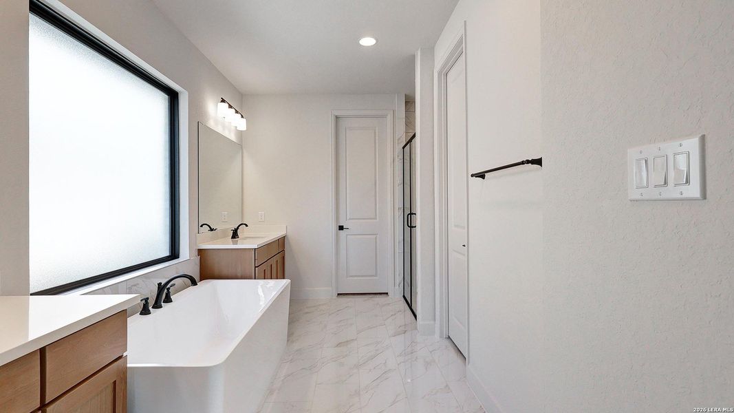 Furnished interior view inside a new home in Ladera, San Antonio (Image 11).